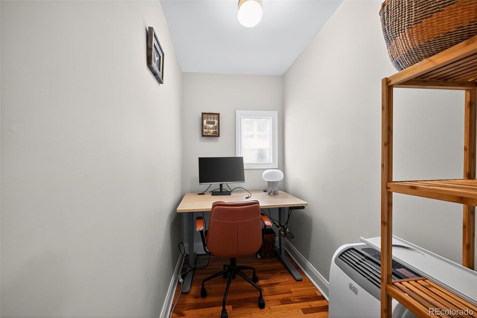 726 Fox Street Denver, CO 80204 - Photo 19 of 33 a workspace with furniture and a window