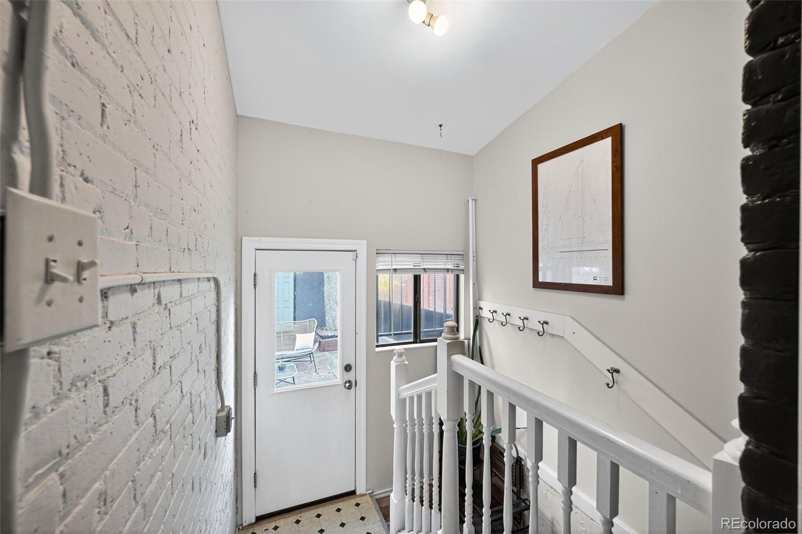 726 Fox Street Denver, CO 80204 - Photo 23 of 33 a view of a hallway with interior of the house