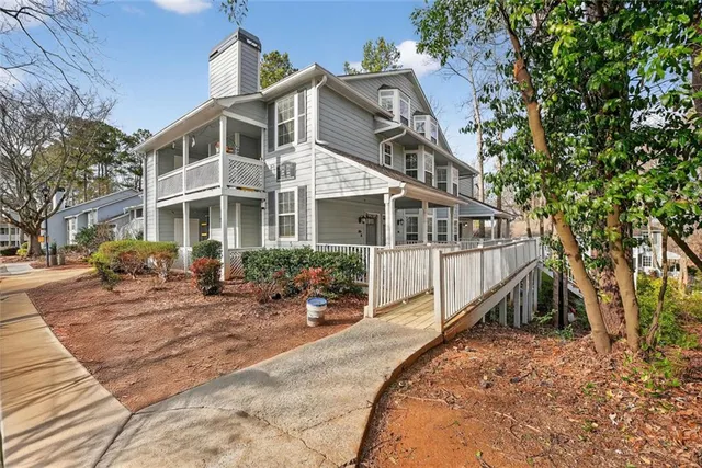 a view of front door deck and living room