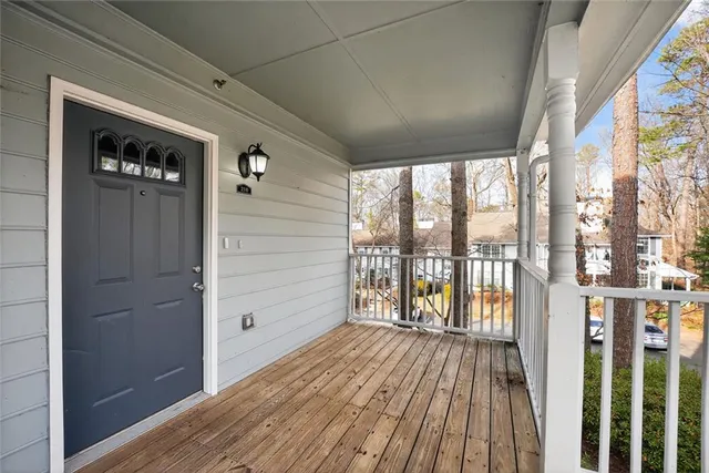 a view of front door deck and living room