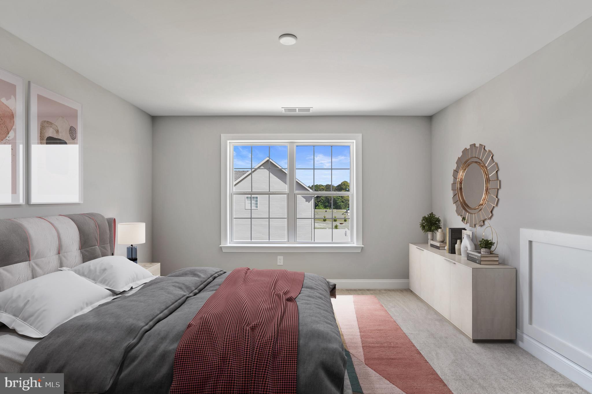 296 Robbins Road, Unit GEO Frederica, DE 19946 - Photo 16 of 16 a bed room with a bed and a window