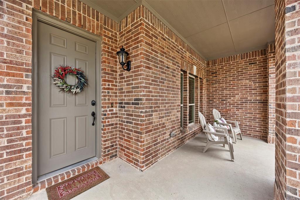 1084 Imperial Eagle Road Alvarado, TX 76009 - Photo 5 of 39 a view of wooden door with a bench