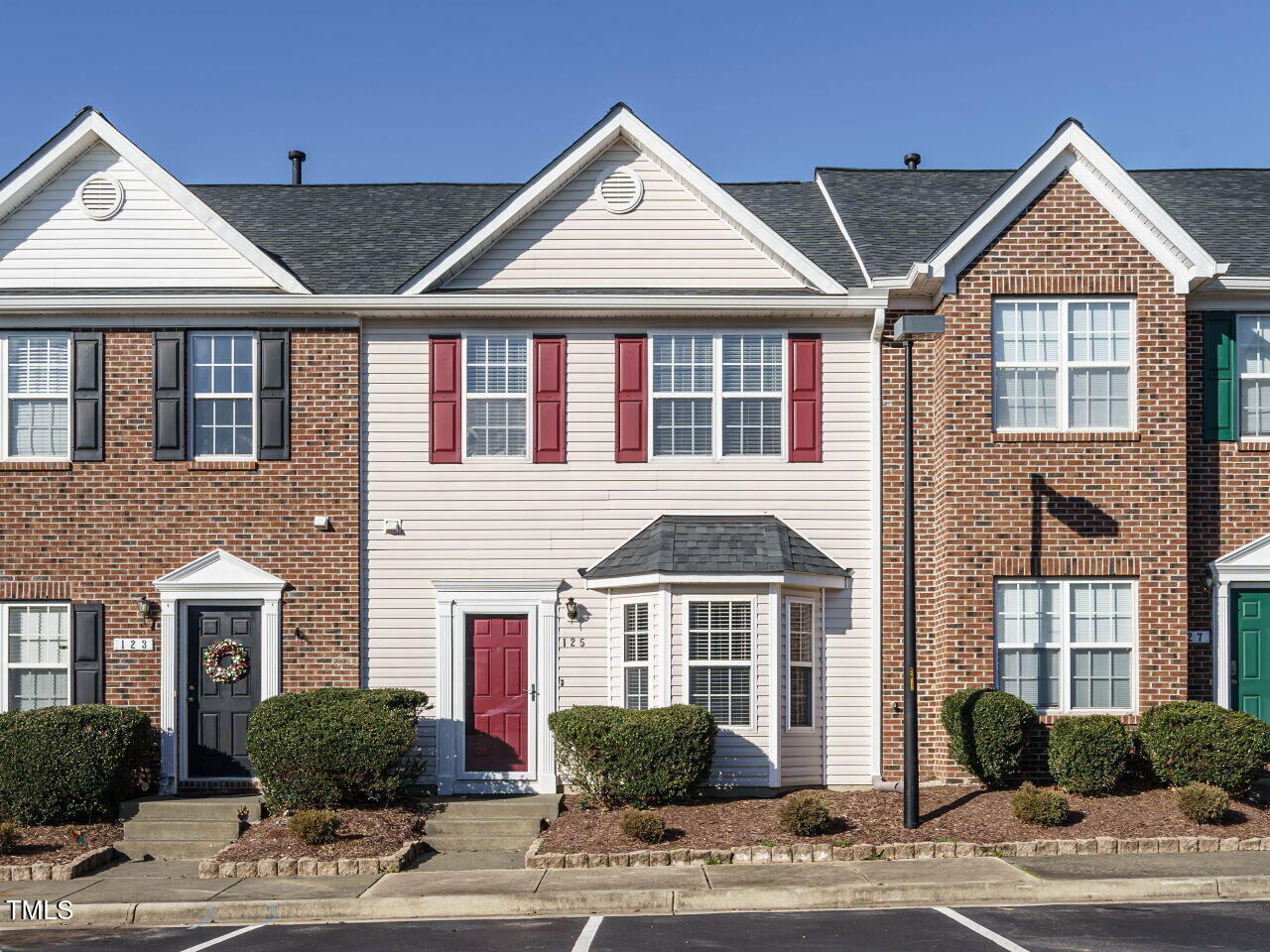 125 Watertree Lane Apex, NC 27502 - Photo 1 of 32 a front view of a house a street