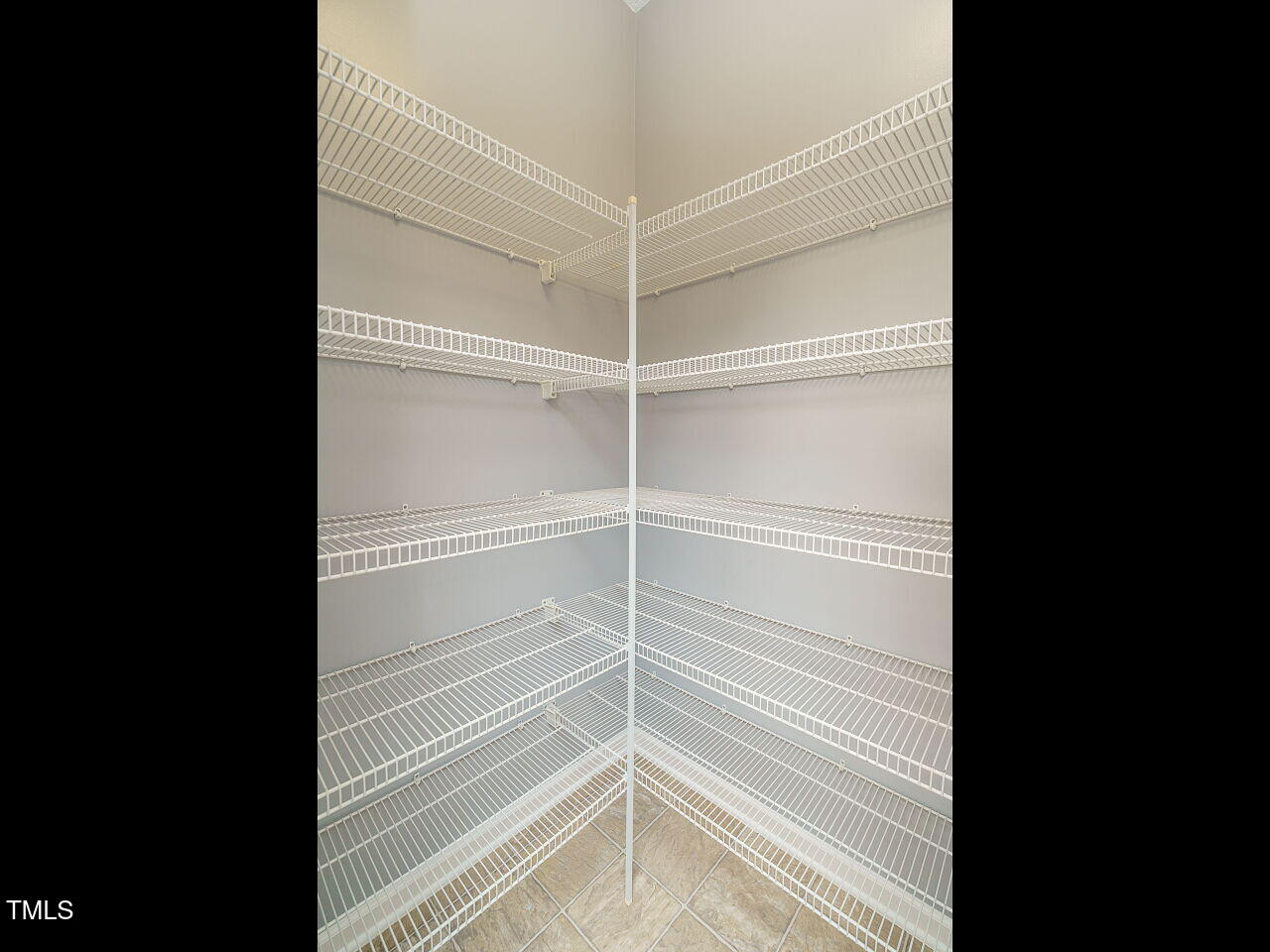 125 Watertree Lane Apex, NC 27502 - Photo 15 of 32 a view of a room with rack on the wall