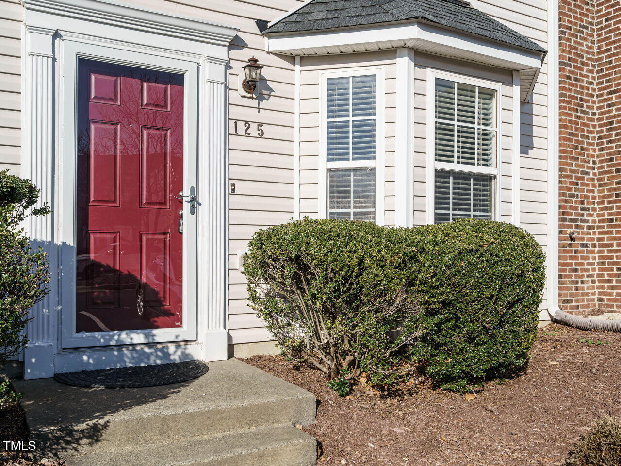 125 Watertree Lane Apex, NC 27502 - Photo 30 of 32 a view of a house with a yard