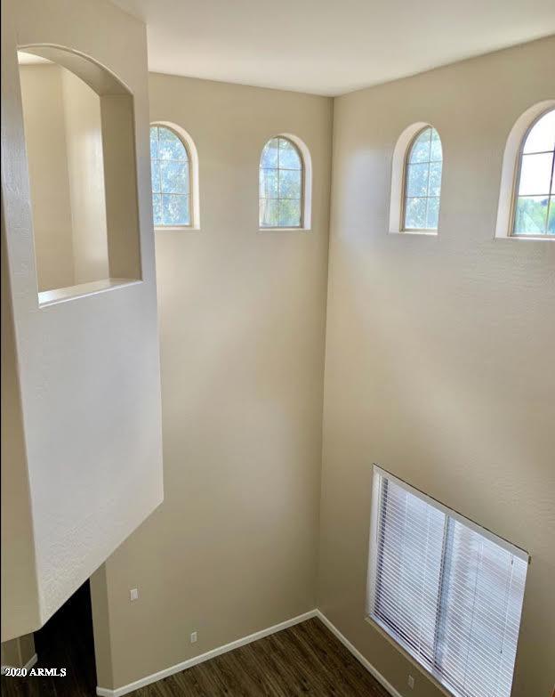 140 West Cardinal Way Chandler, AZ 85286 - Photo 26 of 44 a view of room with window and wooden floor
