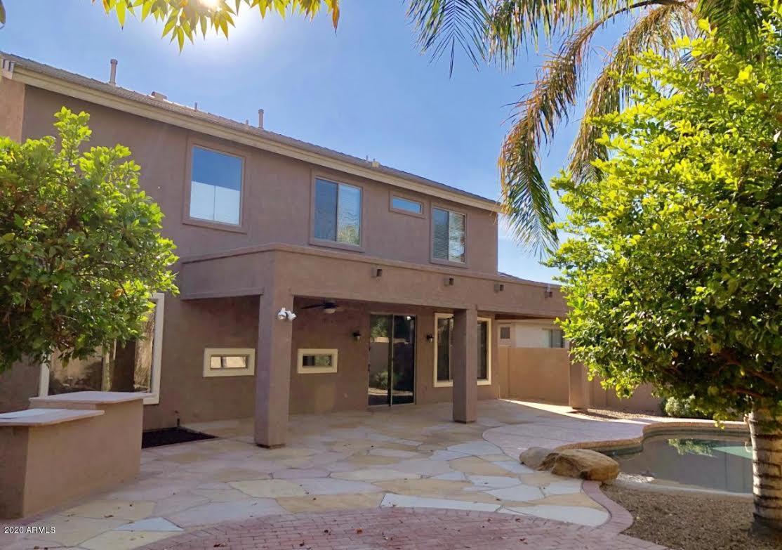 140 West Cardinal Way Chandler, AZ 85286 - Photo 43 of 44 a front view of a house with a yard