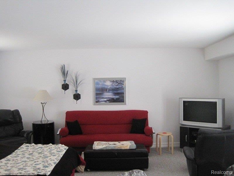 1397 Decker Road Walled Lake, MI 48390 - Photo 17 of 25 Addn Living Area.jpg