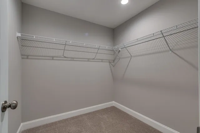 a view of a room with racks on the wall