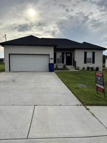 a front view of house with yard