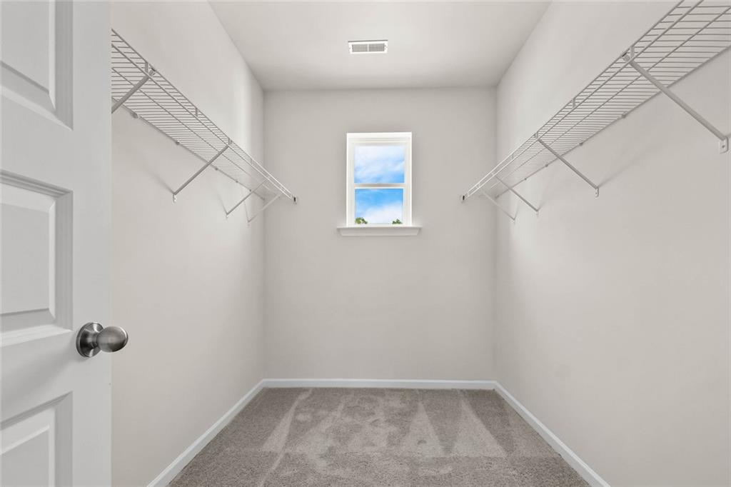 6 Cavalier Court Rome, GA 30165 - Photo 21 of 30 a view of small space with racks on the wall