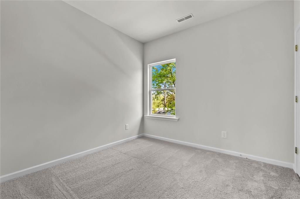 6 Cavalier Court Rome, GA 30165 - Photo 24 of 30 a view of an empty room with a window