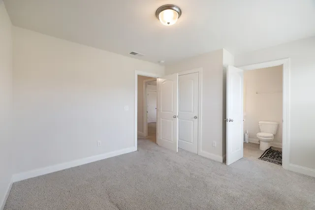 a view of room with bathroom