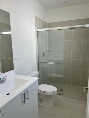 a view of an empty room with white door