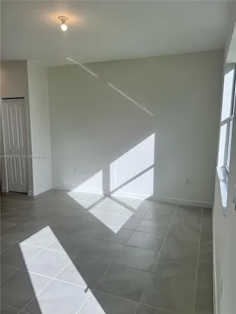 an empty room with a window