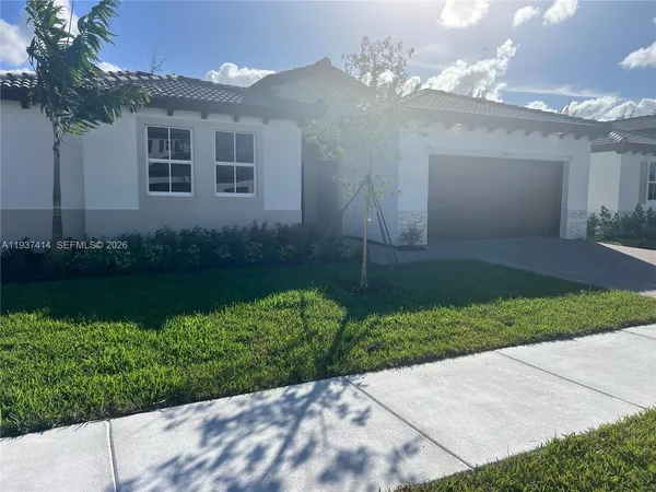 a view of a back yard of the house