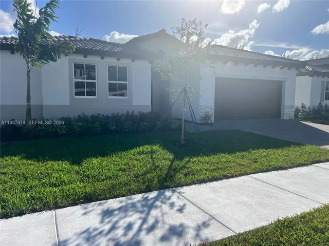 a view of a back yard of the house
