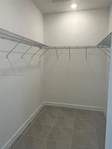 a view of a room with an empty space