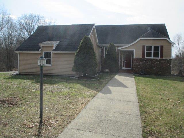 1205 Durham Road Wallingford, CT 06492 - Photo 1 of 1 a front view of a house with garden