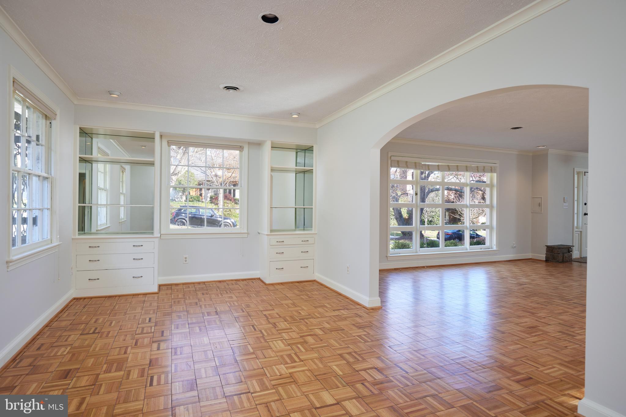 5310 Oakland Road Chevy Chase, MD 20815 - Photo 12 of 45 wooden floor in an empty room with a window