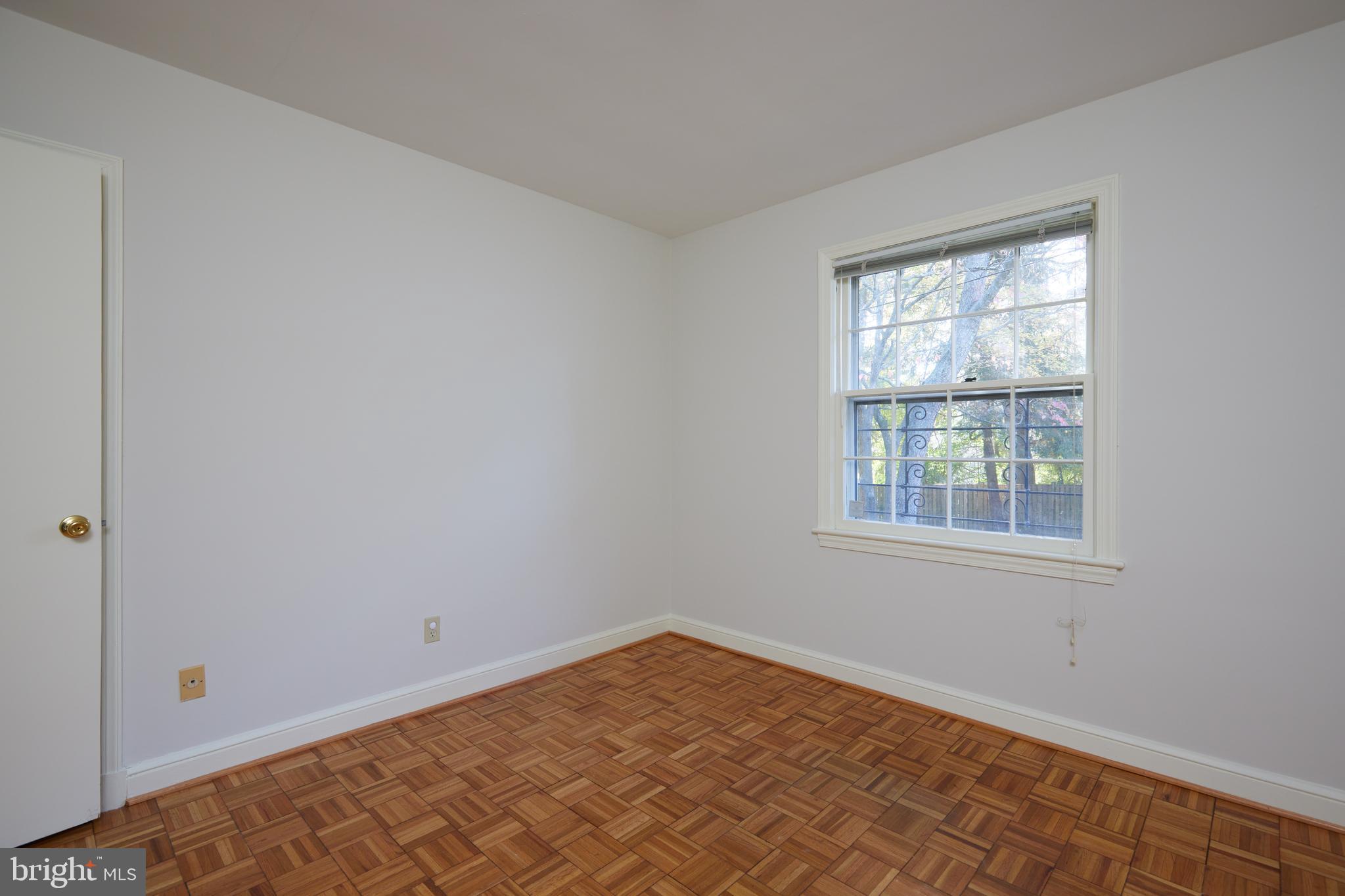 5310 Oakland Road Chevy Chase, MD 20815 - Photo 31 of 45 an empty room with a window
