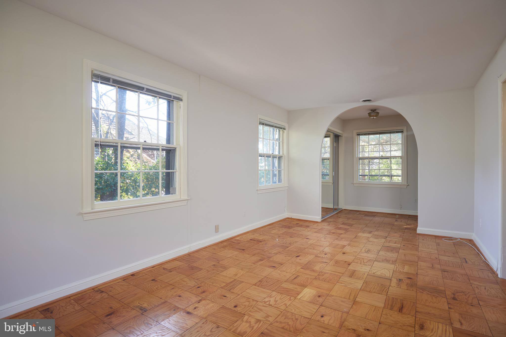 5310 Oakland Road Chevy Chase, MD 20815 - Photo 33 of 45 an empty room with windows and closet