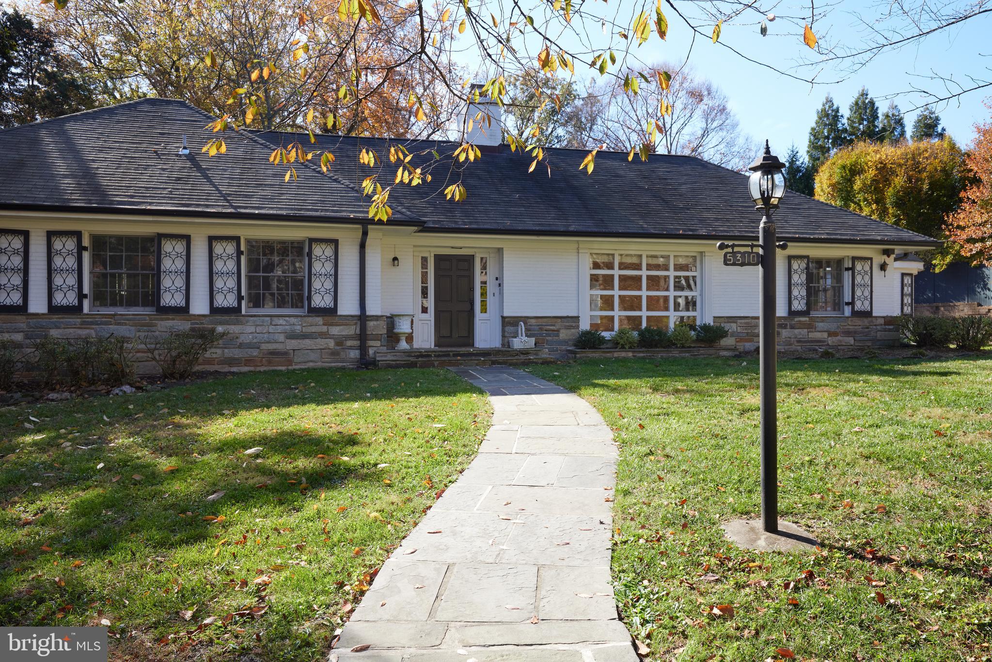 5310 Oakland Road Chevy Chase, MD 20815 - Photo 38 of 45 a front view of a house with a yard