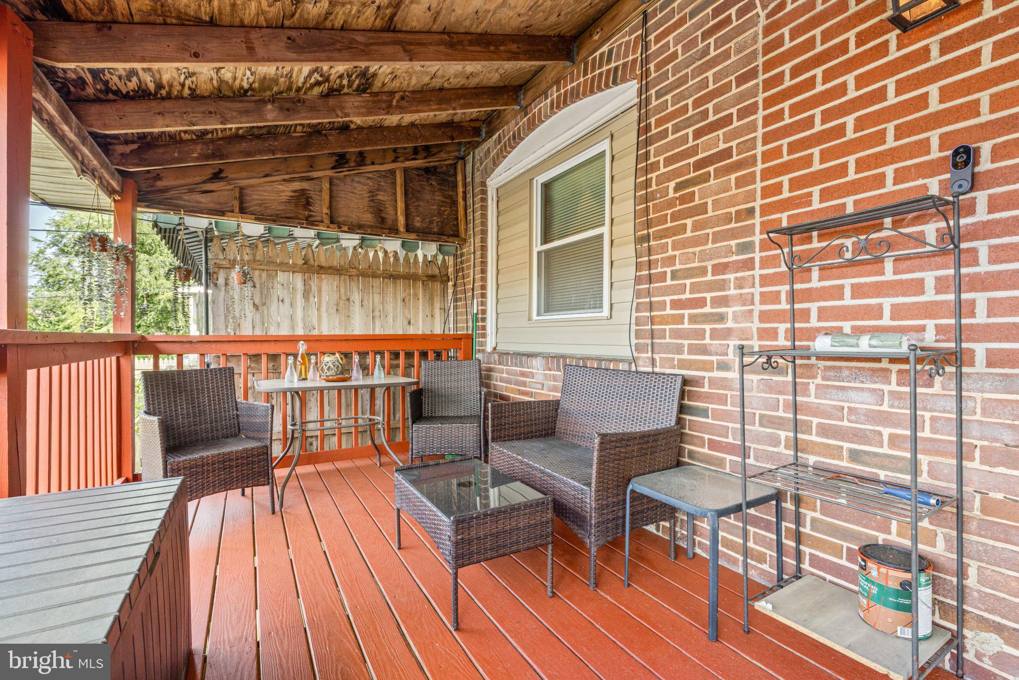 234 West Edgevale Road Baltimore, MD 21225 - Photo 26 of 45 Charming outdoor retreat on the porch.