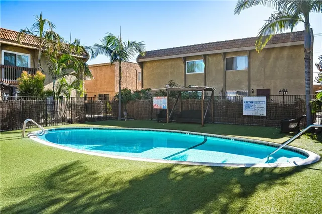 a view of a house with swimming pool