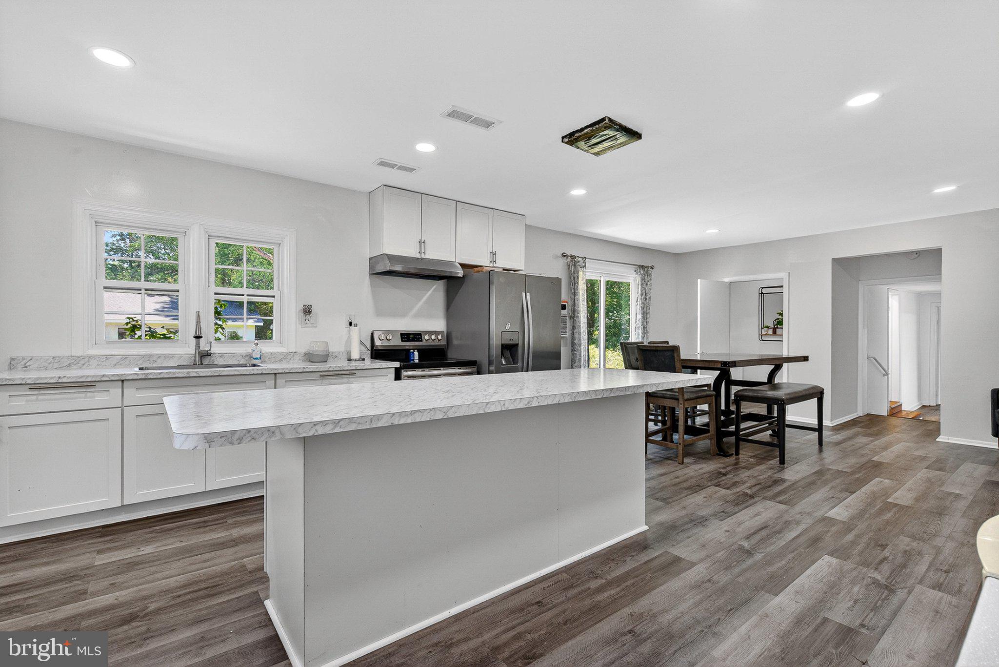 607 Dembytown Road, Unit B Joppa, MD 21085 - Photo 9 of 55 Bright and airy modern kitchen space.