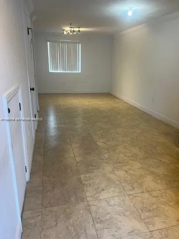 a bathroom with a sink and a window