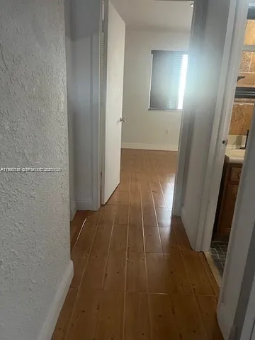 a bathroom with a sink and a shower