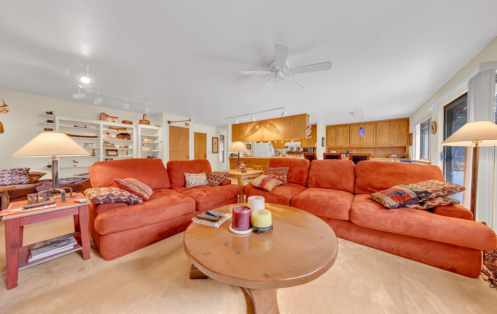 608 East Burnt Cedar Road Lake Almanor, CA 96137 - Photo 9 of 36 a living room with furniture a lamp and a large window