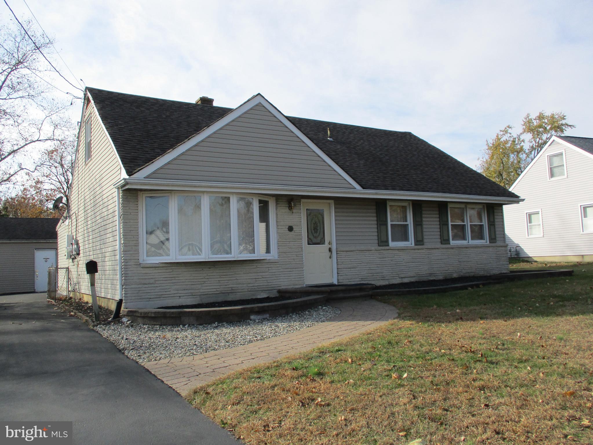 482 Westminster Road Wenonah, NJ 08090 - Photo 2 of 26 a front view of a house with a garden