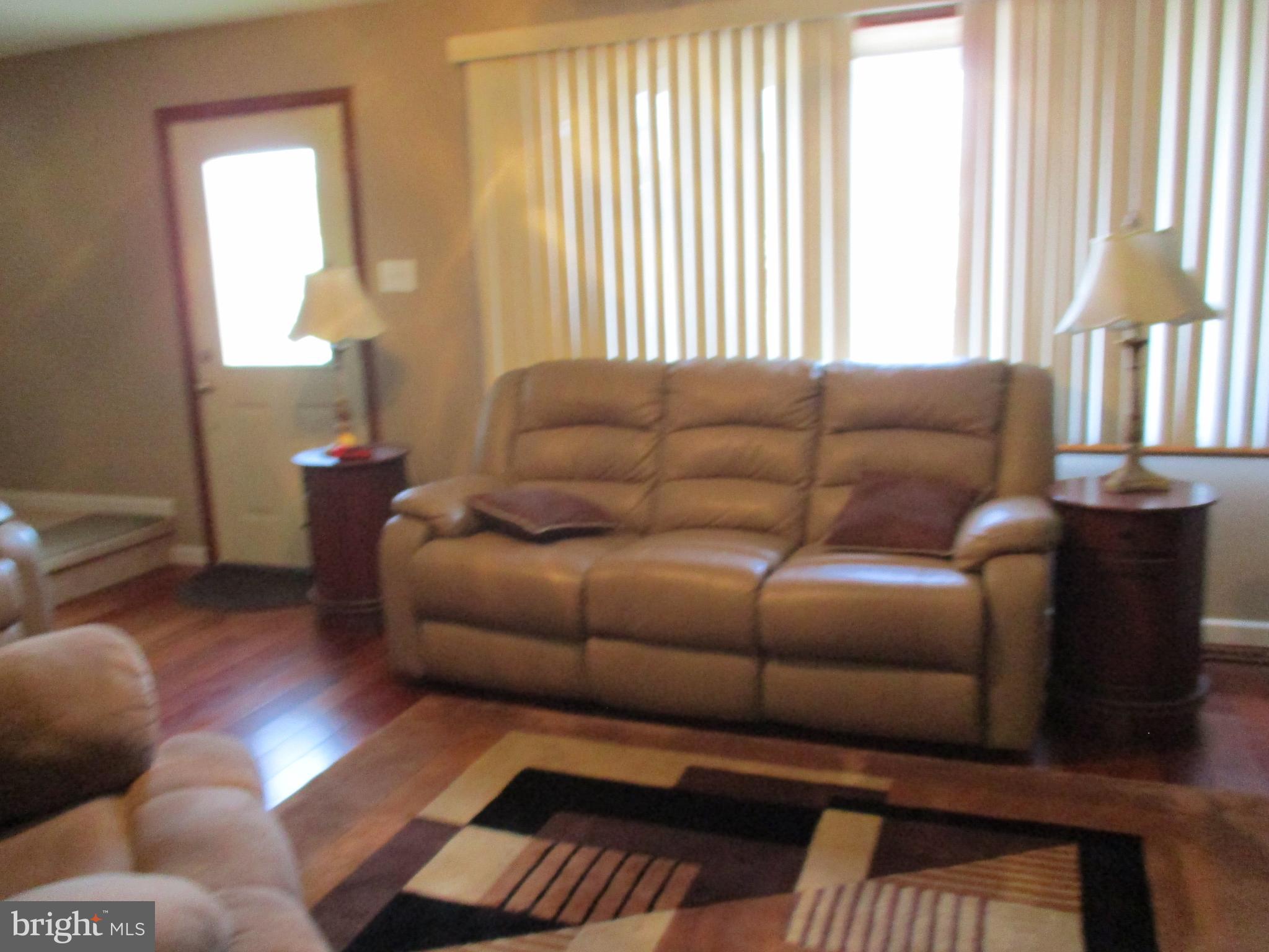 482 Westminster Road Wenonah, NJ 08090 - Photo 11 of 26 a living room with furniture and a window