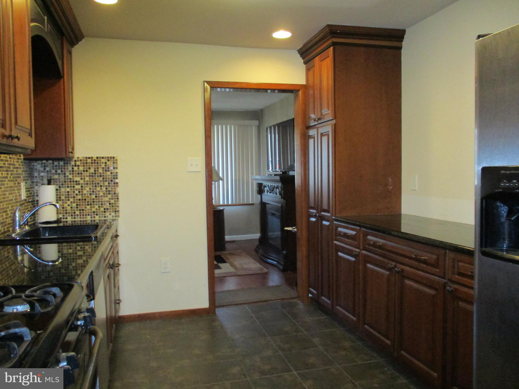 482 Westminster Road Wenonah, NJ 08090 - Photo 13 of 26 a view of a kitchen from the hallway