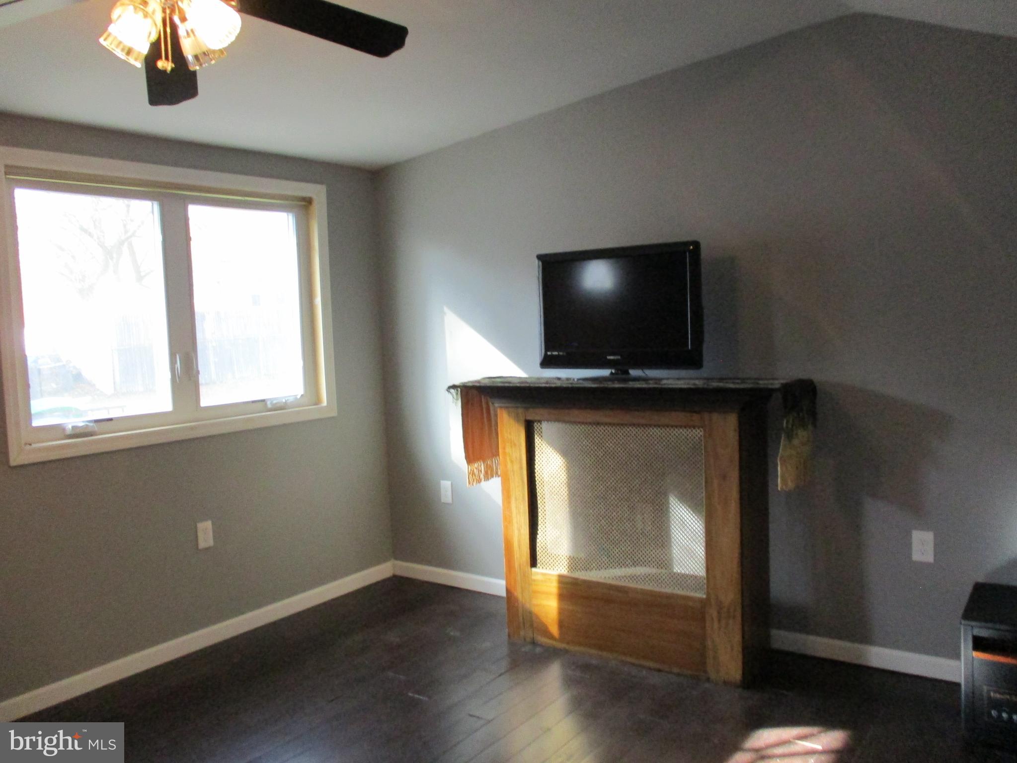 482 Westminster Road Wenonah, NJ 08090 - Photo 15 of 26 a view of workspace with window and flat screen tv