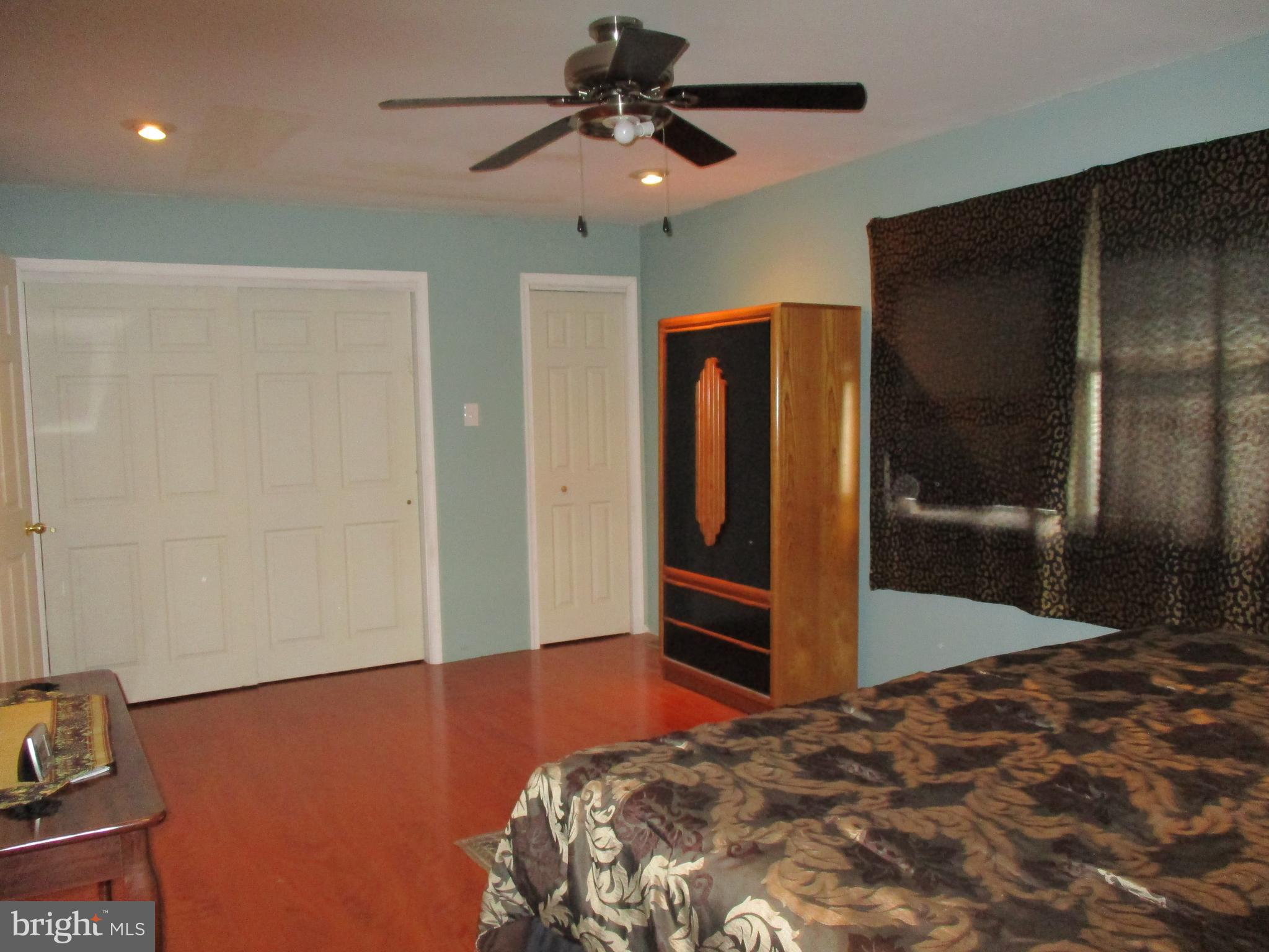 482 Westminster Road Wenonah, NJ 08090 - Photo 18 of 26 a bedroom with a bed and a chandelier