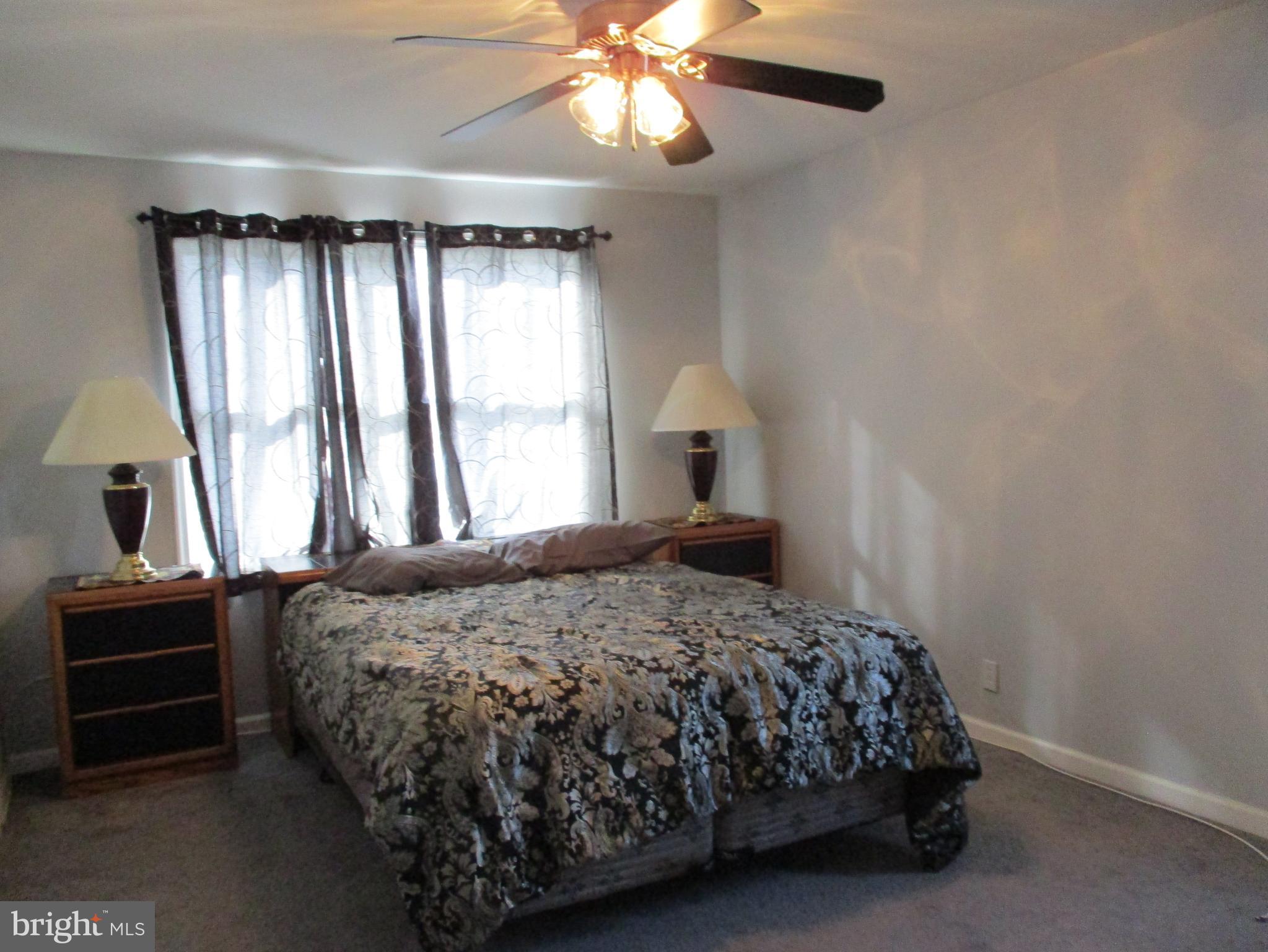 482 Westminster Road Wenonah, NJ 08090 - Photo 24 of 26 a bedroom with a bed and window
