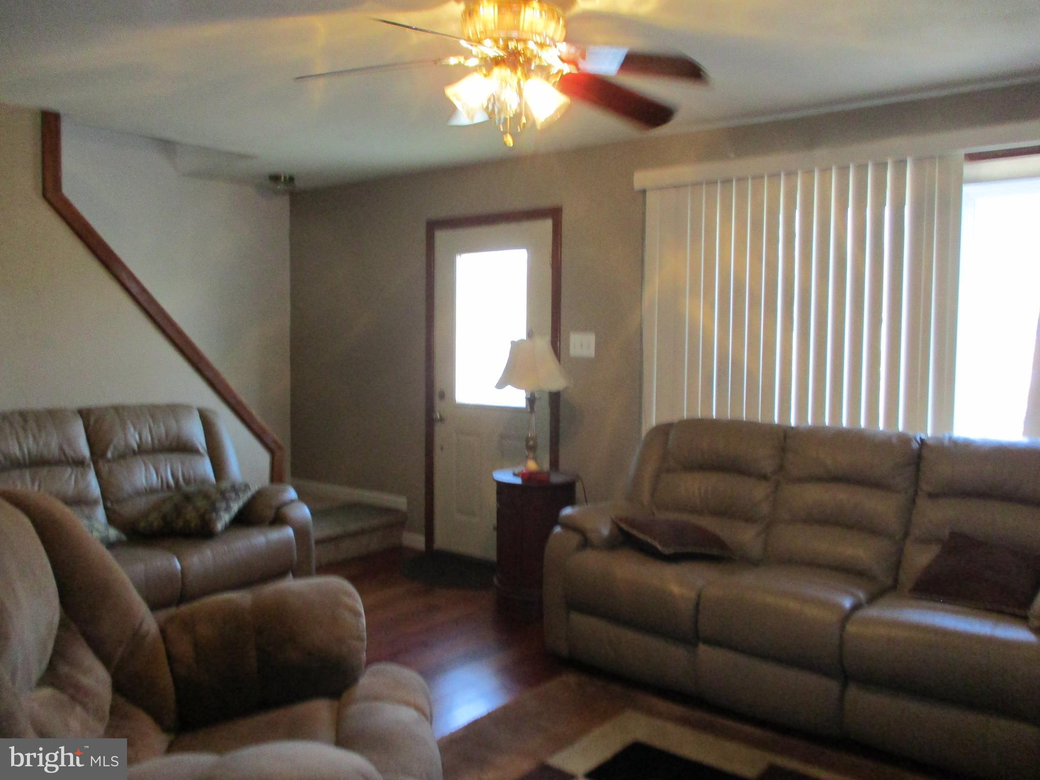 482 Westminster Road Wenonah, NJ 08090 - Photo 9 of 26 a living room with furniture and a large window