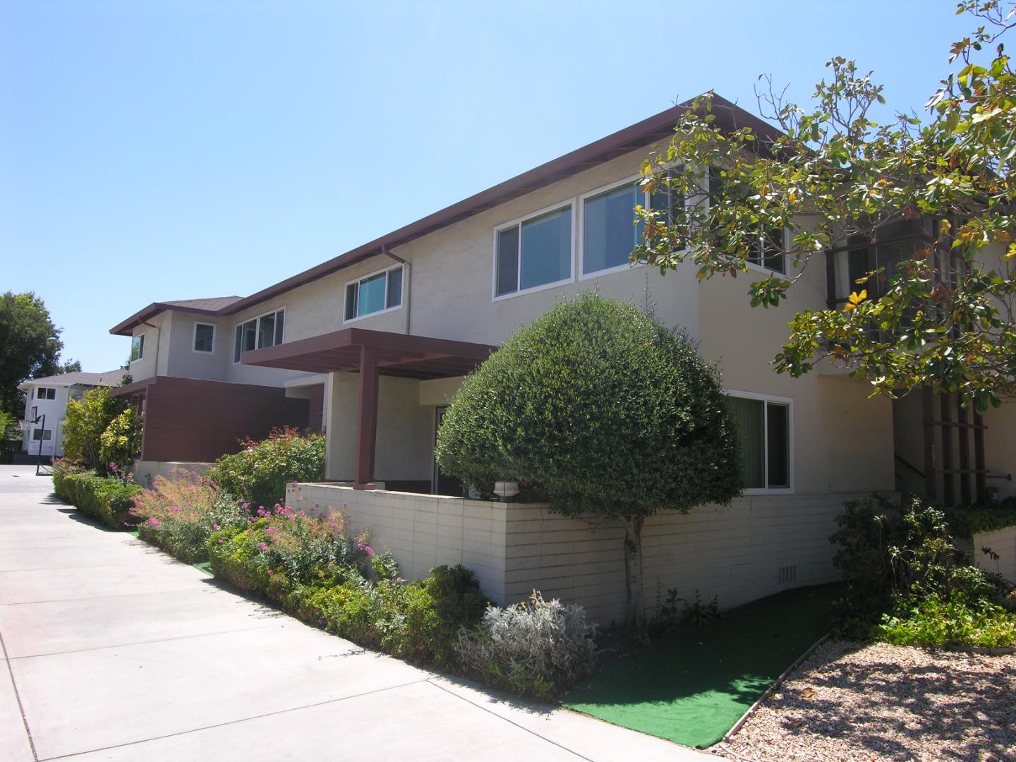 751 Roble Avenue Menlo Park, CA 94025 - Photo 1 of 41 a front view of a house with a garden