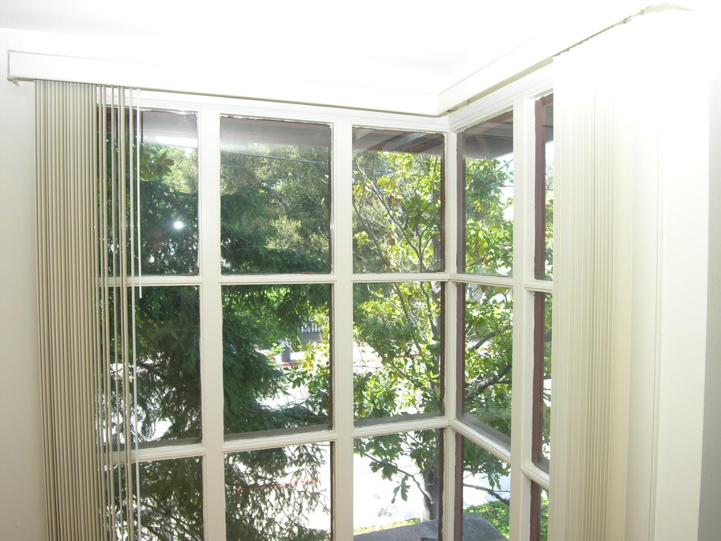 751 Roble Avenue Menlo Park, CA 94025 - Photo 11 of 41 a view of a glass room with floor to ceiling windows