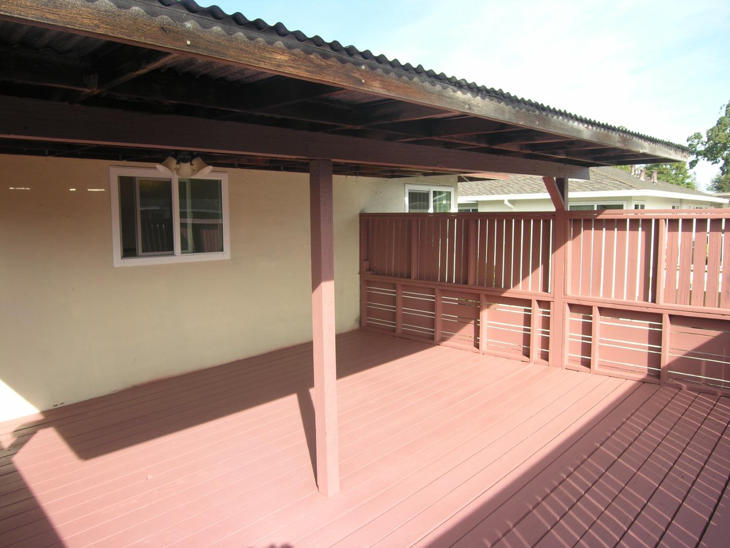 751 Roble Avenue Menlo Park, CA 94025 - Photo 31 of 41 a balcony with a table and chairs