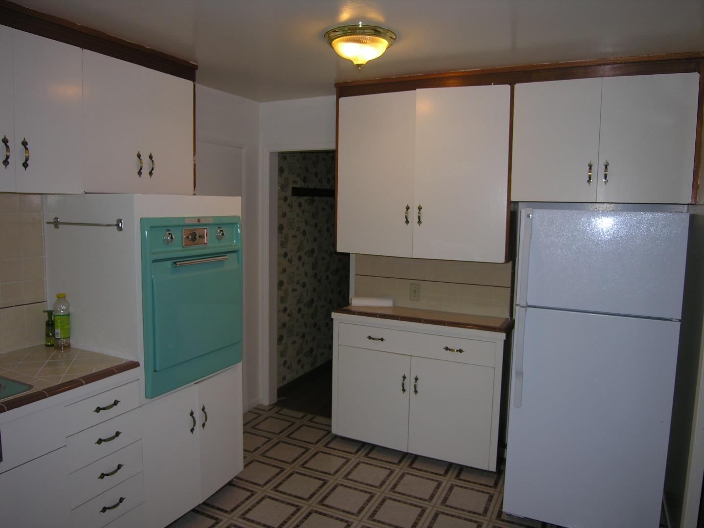 751 Roble Avenue Menlo Park, CA 94025 - Photo 38 of 41 a kitchen with a refrigerator and a stove