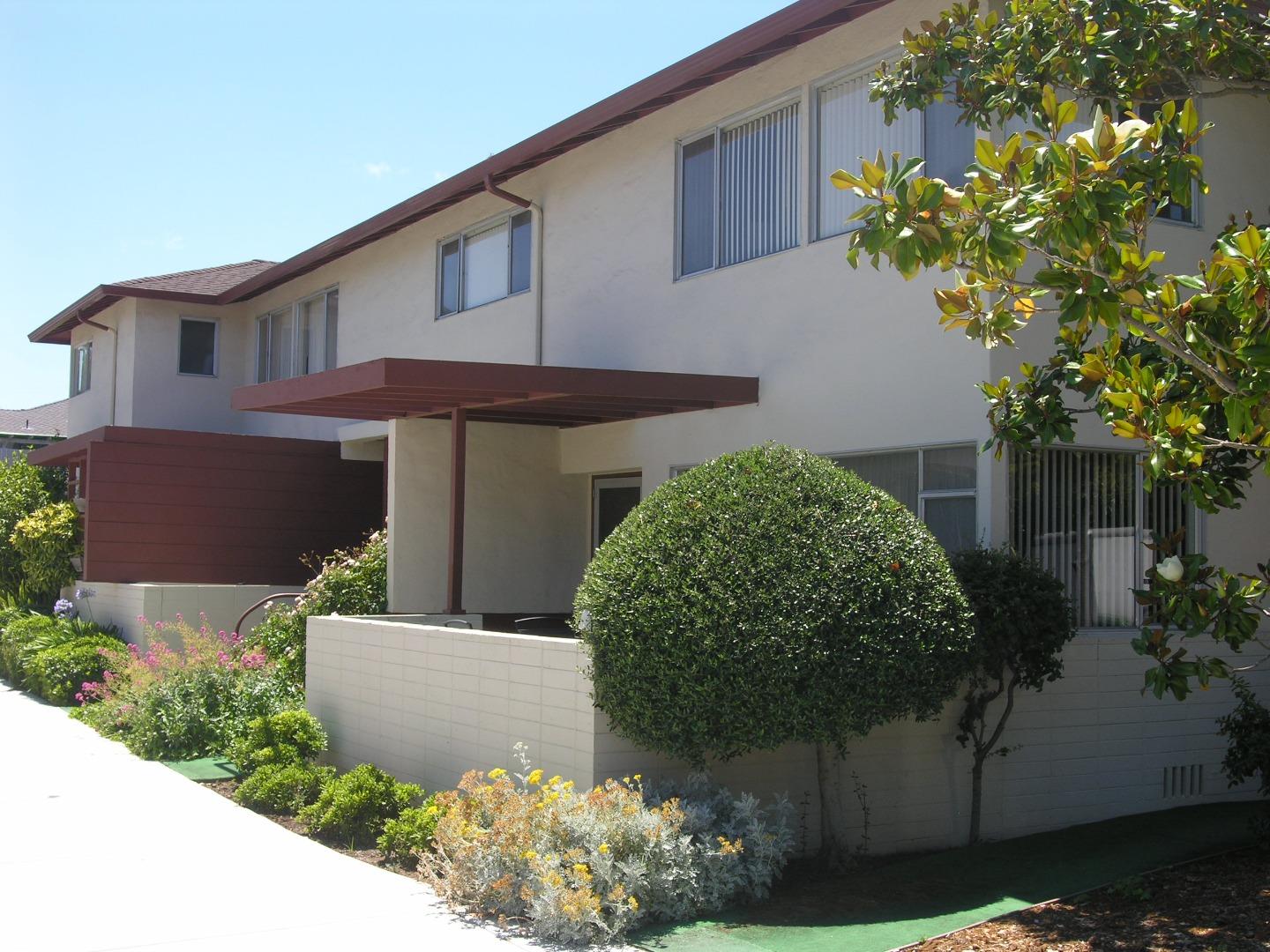 751 Roble Avenue Menlo Park, CA 94025 - Photo 4 of 41 a front view of a house with garden