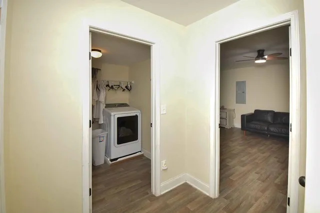 a en suite bathroom with a toilet sink and vanity