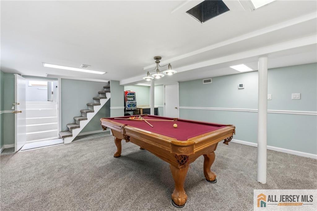 50 3rd Street Fords, NJ 08863 - Photo 27 of 36 a room with pool table and windows