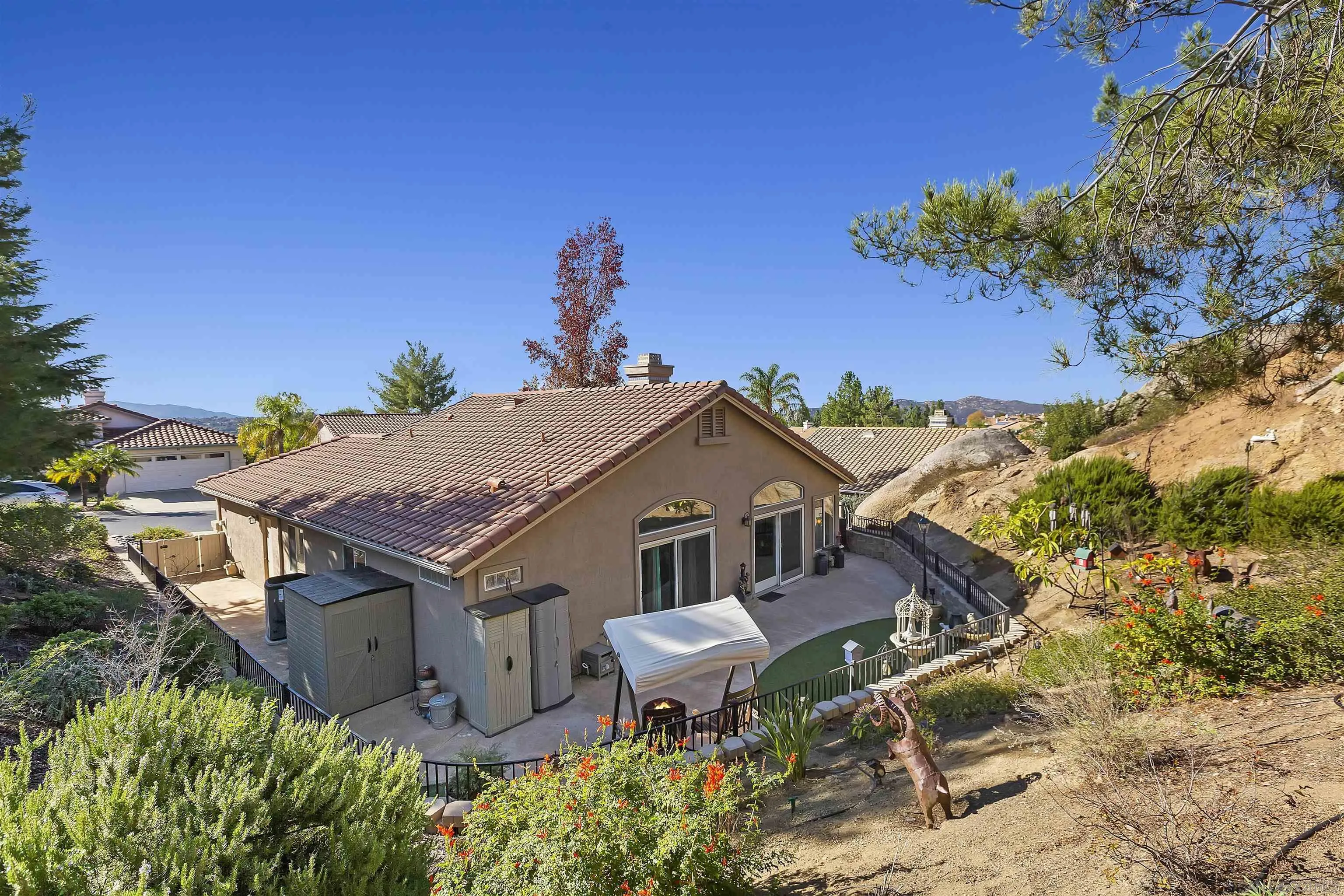 2644 Lobelia Road Alpine, CA 91901 - Photo 29 of 33 an aerial view of a house with garden space and street view
