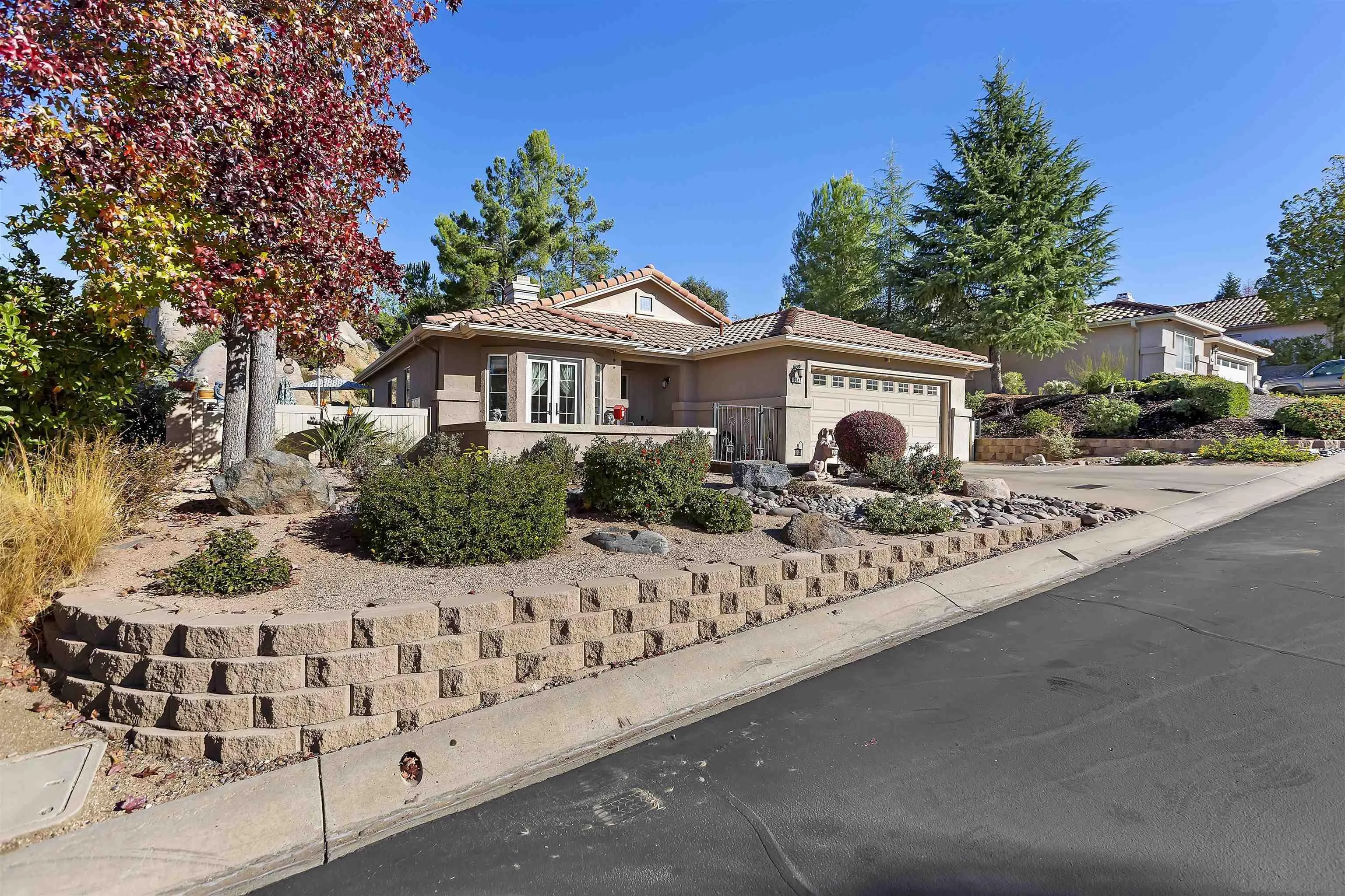 2644 Lobelia Road Alpine, CA 91901 - Photo 4 of 33 a front view of a house with a yard