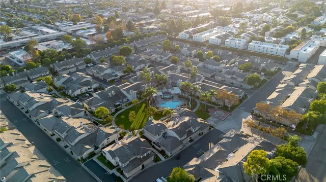 an aerial view of a city with lots of residential buildings